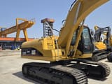 2019 Caterpillar 320C excavator, rear three-quarter view