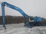 2001 Fuchs MHL360 material handler, side view