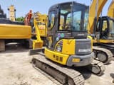 2018 Komatsu PC-55MR mini excavator, rear three-quarter view