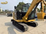 Caterpillar 305.5E2 mini excavator, rear three-quarter view