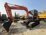 2023 Hitachi ZX75 crawler excavator, front three-quarter view