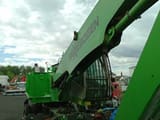 2022 Sennebogen 818-E wheel excavator, side view of boom and cab