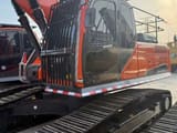 2023 Doosan DX300LC-9C crawler excavator, side view of cab and tracks