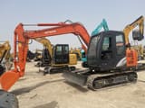 2024 Hitachi ZX70 crawler excavator, front three-quarter view