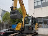 2026 XCMG XE135 crawler excavator, front three-quarter view