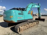 2015 Kobelco SK210LC-10 crawler excavator, rear three-quarter view