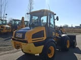 2019 JCB 409 wheel loader, front three-quarter view