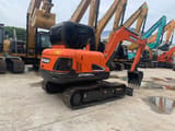 2022 Doosan DX60-9C crawler excavator rear three-quarter view