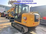 2023 Caterpillar 305.5E2 mini excavator, rear three-quarter view