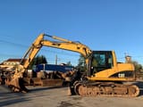 2005 Caterpillar 312CL crawler excavator, side view