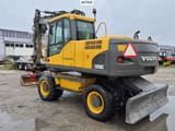 2009 Volvo EW160C wheel excavator, rear three-quarter view
