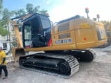 2024 Caterpillar 324D2 L crawler excavator, rear three-quarter view