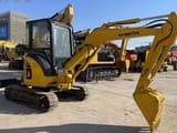 Komatsu PC35 mini excavator, front three-quarter view