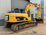 2011 Caterpillar 319DL crawler excavator, rear three-quarter view