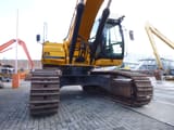 2010 JCB JS460LC crawler excavator, low-angle front view