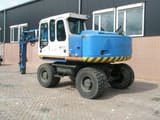 2002 Atlas 1404 wheel excavator, side profile view