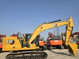 2023 Caterpillar 323GC crawler excavator side view