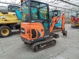 2017 Doosan DX19 mini excavator, rear three-quarter view