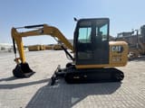 2023 Caterpillar 305.5E2 mini excavator, side profile view
