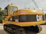 Caterpillar 320CL crawler excavator, rear three-quarter view