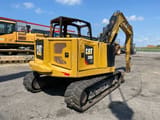 2019 Caterpillar 308 CR crawler excavator, rear three-quarter view