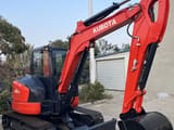 2022 Kubota U55-4 mini excavator, side profile view