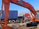 2023 Doosan DH225LC-7 crawler excavator, side profile view