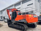 2023 Doosan DX300LC-9C crawler excavator, rear three-quarter view