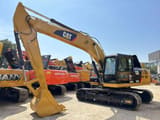 2015 Caterpillar 323DL crawler excavator, side view