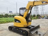 2022 Caterpillar 305C CR mini excavator, rear three-quarter view