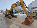 2019 Caterpillar 318FL crawler excavator, front three-quarter view