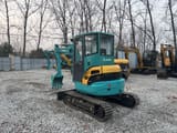 2022 Kubota U35 mini excavator, rear three-quarter view