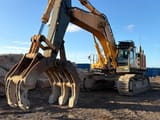 2013 Hyundai R800LC-9 crawler excavator with grapple attachment