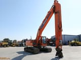2010 Doosan DX300 long-reach crawler excavator, side view