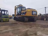 2024 Caterpillar 315D crawler excavator rear three-quarter view