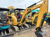Caterpillar 303E Mini Excavator, side view
