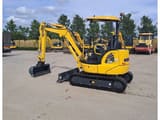 2024 Komatsu PC33E-6 mini excavator, rear three-quarter view
