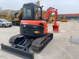 2022 Kubota U55-4 mini excavator, front three-quarter view