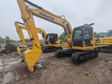 Komatsu PC120-6 crawler excavator, front three-quarter view