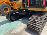 2023 Caterpillar 320GC crawler excavator undercarriage view