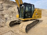 2022 Caterpillar 320 crawler excavator, side view