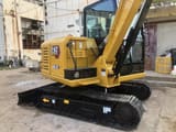 2011 Caterpillar 305.5E2 mini excavator, rear three-quarter view