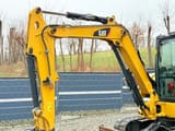 2019 Caterpillar 305.5E mini excavator boom and cab view