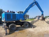 2017 Fuchs MHL320 material handler, side view