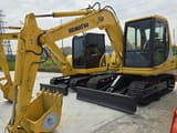 2020 Komatsu PC60 mini excavator, front three-quarter view