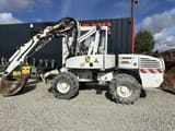 2005 Mecalac 12MXT wheel excavator side view