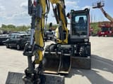 2023 Wacker Neuson EW100 wheel excavator, front view
