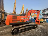2018 Hitachi ZAXIS 200 crawler excavator, rear three-quarter view