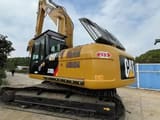 2023 Caterpillar 330D crawler excavator, rear three-quarter view