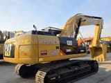 2023 Caterpillar 330D2 excavator, rear three-quarter view